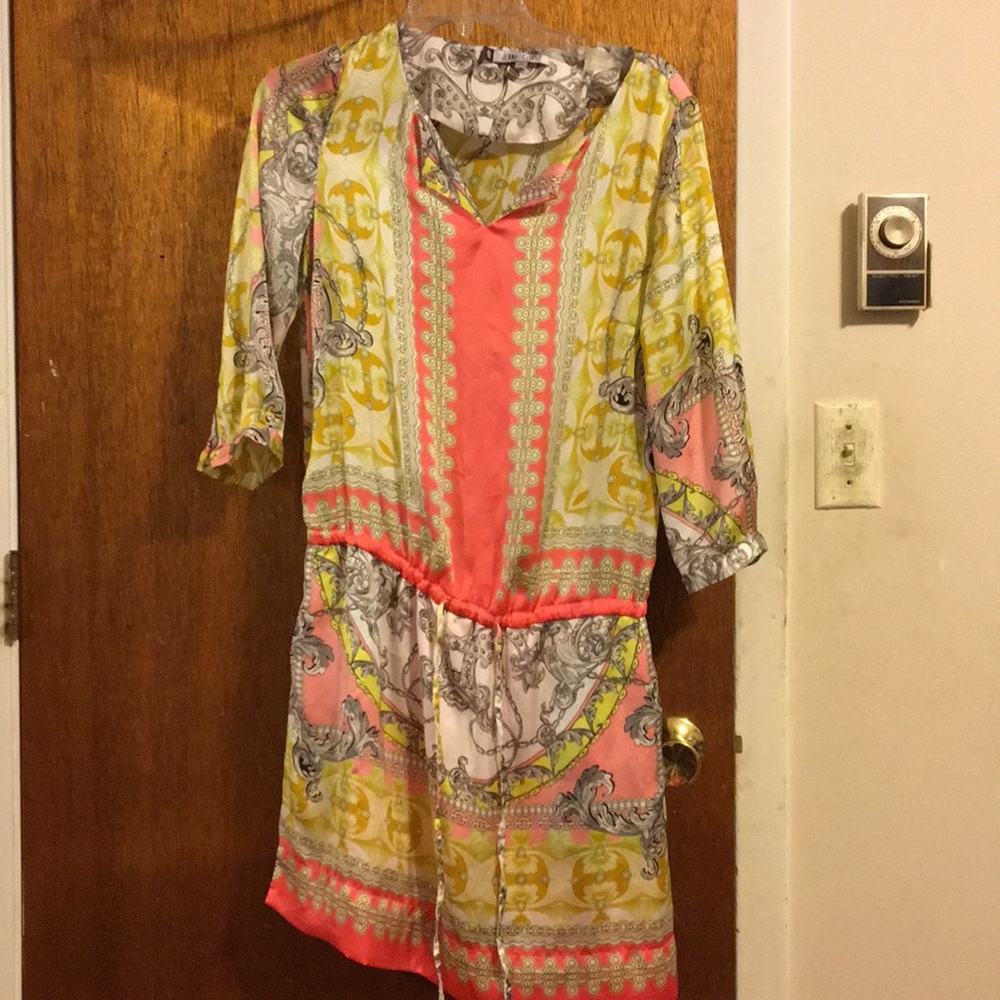 Jennifer Lopez yellow and pink floral dress.